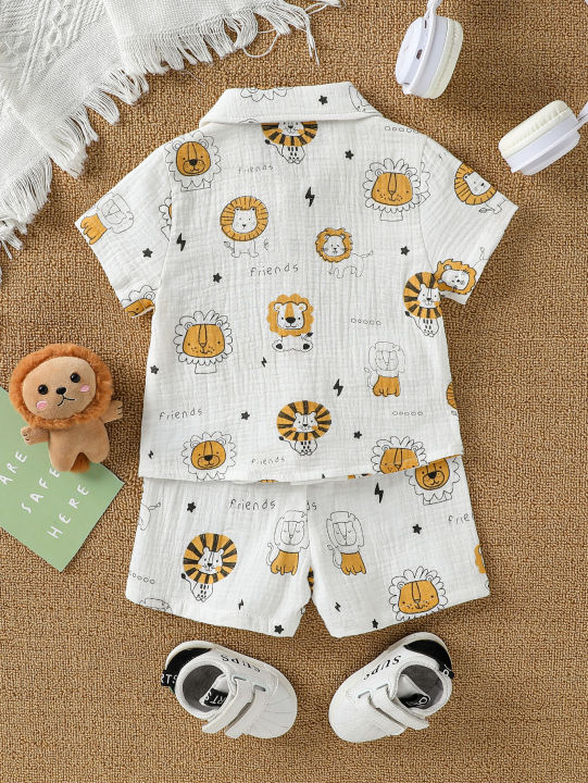 2025%20New%20Summer%20Cartoon%20Printed%20Short-sleeved%20T-shirt%20and%20Shorts,%20Versatile%20Two-piece%20Set%20for%20Baby%20Boys%20-%20Image%202