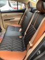 Toyota Yaris Seatcovers Full Design Black and Rust With Rust Stitching. 