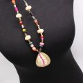 Bohemian beads long pendant mala with metal leaf summer jewelry. 