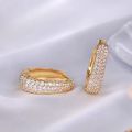 Huitan Hollow Gold Color Hoop Earrings for Women Paved Dazzling CZ Stone Luxury Trendy Female Circle Earrings Statement Jewelry.