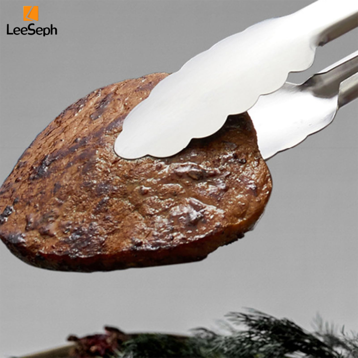 Leeseph%20Stainless%20Steel%20Food%20Tongs,%20Heavy%20Duty%20Kitchen%20Tongs%20with%20Wooden%20Handle%20for%20Cooking,%20Grilling%20and%20BBQ,%207-16%20Inch%20Length%20-%20Image%204