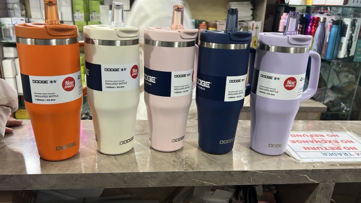 Dodge%20Tumbler%2040oz%20Stainless%20Steel%201200ml%20Heavy%20Duty%201200%20ml%20(42.2%20oz)%20%0AInsulation:%20Double-wall%20stainless%20steel%20to%20keep%20beverages%20hot%20or%20cold%20for%20hours%20%0AFeatures:%20Some%20models%20have%20a%20dual-mode%20lid%20with%20a%20flip-top%20and%20a%20straw,%20and%20a%20handle%20for%20easy%20carrying%20-%20Image%203