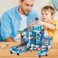 City police station building block group boy DIY car brick police station model building children's educational toy .