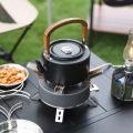 1.2L Lightweight Aluminum Alloy Camping Kettle with Wooden Handle Black And Gray Portable Outdoor Cooking Pot.