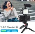 Mobile Vlogging Kit, Video Making kit, with tripod stand, Microphone, Led Light, Mobile Holder 
Vlogging Kit Accessories for Mobile Phone DSLR Camera Video Recording.. 