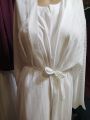 White abaya with different styles. 