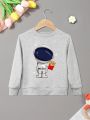 Cartoon Spaceman And Fries Print Children Creative Sweatshirt Casual Lightweight Comfy Tops Kids Clothings. 