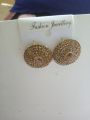 shampion colour  circle. studs earrings nice 100 %original jewellery nice quality. 