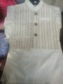 white kameez shalwar with waistcoat. 