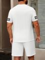 Hot Selling Summer New Men's Set with Letter Print Casual Fashion T-Shirt Short-Sleeved Shorts Sports Outdoor Set.