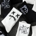 Random multiple pairs of men's crew socks graffiti ghost face unique street trend moisture wicking. 