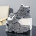 A pair of children's winter velvet warm snow boots with leather waterproof and anti-slip wear-resistant high-top cotton shoes. 