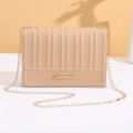 Trendy simple solid color embossed crossbody small square bag high-end vertical striped crossbody shoulder women's bag. 