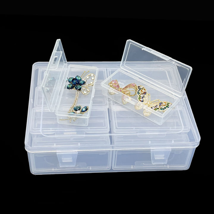A%20plastic%20storage%20box%20with%2012/14%20adjustable%20dividers%20-%20suitable%20for%20storing%20jewelry,%20DIY%20crafts,%20small%20tools,%20and%20some%20candies%20-%20Image%202