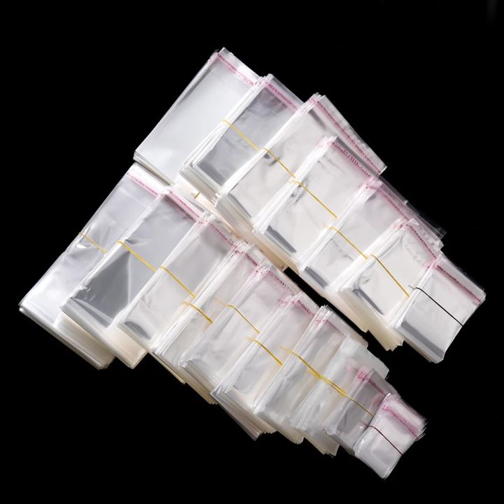 100pcs/lot%20Transparent%20Self%20Adhesive%20Seal%20Bags%20OPP%20Plastic%20Cellophane%20Bags%20%20Bag%20&%20Pouch%20Jewelry%20Packaging%20Bags%20-%20Image%203