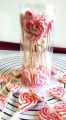 heart shaped strawberry flavored red and white swirl lollipop candy 25pc bucket. 