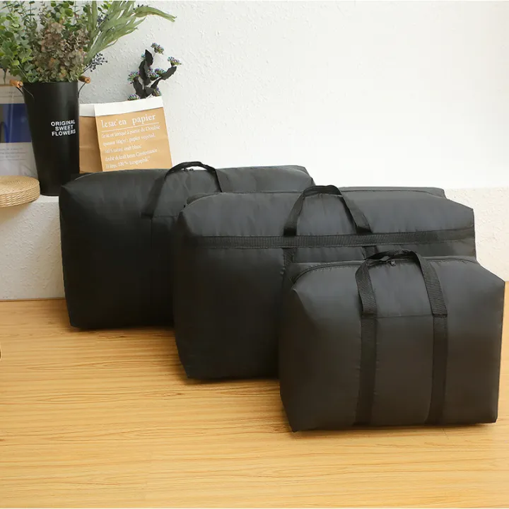 super%20large%20capacity%20travel%20duffel%20bag%20foldable%20luggage%20travel%20bag%20Waterproof%20Polyester%20Organizer%20Cloth%20Quilt%20Storage%20Bag%20-%20Image%204