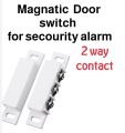 Magnetic door window switch for security alarm. 