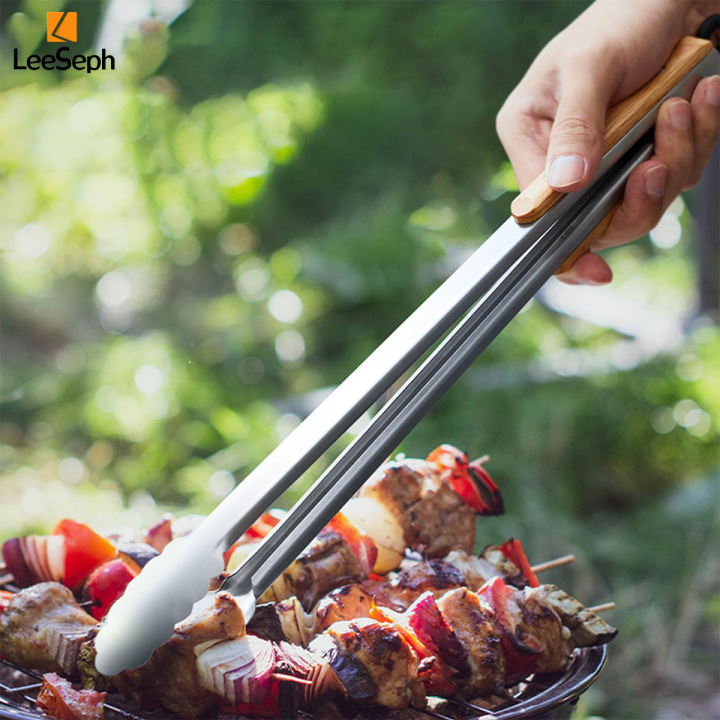Leeseph%20Stainless%20Steel%20Food%20Tongs,%20Heavy%20Duty%20Kitchen%20Tongs%20with%20Wooden%20Handle%20for%20Cooking,%20Grilling%20and%20BBQ,%207-16%20Inch%20Length%20-%20Image%206