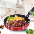 1 Piece Non stick frying pan metallic bottom or underside isolated on white background, -18.5cm. 