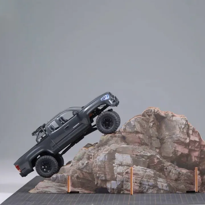 FMS%20Tacoma%20Officially%20Authorized%20Simulation%20Small%20Scale%201:24%204WD%20Remote%20Control%20Climbing%20Car%20RC%20Off-Road%20Vehicle%20FCX24M%20RTR%20-%20Image%206