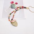 Bohemian beads long pendant mala with metal leaf summer jewelry. 