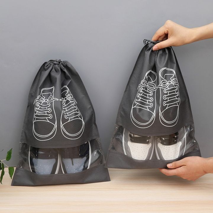 Non-Woven%20Fabric%20Storage%20Shoe%20Bag%20%E2%80%93%20Drawstring%20Travel%20Shoe%20Organizer,%20Dustproof%20&%20Transparent%20Household%20Shoe%20Cover%20%E2%80%93%201%20Pc%20-%20Image%203