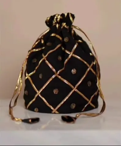 ORANGLES Fancy embroidered clutch/potli bag for wedding parties designer traditional potli gol bag with Handmade Gota work - high resolution display - exposing craftsmanship - Image 2 of 3 | built for everyone | Fancy embroidered clutch/potli bag for wedding parties designer traditional potli gol bag with Handmade Gota work for sale Georgia | Free Shipping ORANGLES