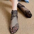 Women shallow transparent invisible thin non slip lace socks.