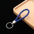 Very cheap 10 colors PU leather fashion keychain woven leather rope keychain bag hanging keychain. 