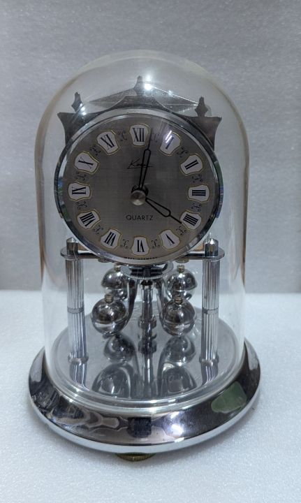 (A). Vintage Kern Sohne Anniversary Clock Glass Dome Mantel Clock. (A)