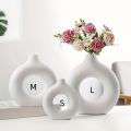 Durable Plastic Modern Decorative Donut Vase - Elegant Nordic-Inspired Centerpiece for Living Room, Bedroom & Desk - Perfect for home decoration item. 