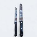 Black handle knife with cover for home and multipurpose use. 
