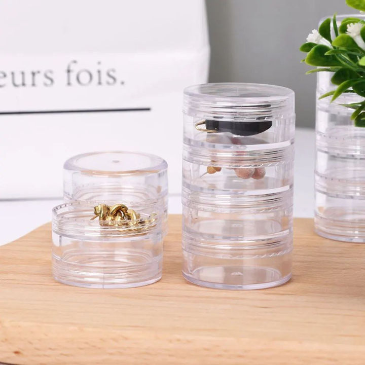 Mini%20Round%20Jewelry%20Storage%20Box%20(5%20Layer)%20%E2%80%93%20Transparent%20Acrylic%20Organizer%20for%20Rings,%20Earrings,%20Studs%20&%20Small%20Accessories%20%7C%20Compact%20360%C2%B0%20Rotating%20Jewelry%20Case%20for%20Dressing%20Table%20&%20Travel%20-%20Image%204