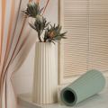 Ribbed vase small size(plantable +artificial flower decorative)size 10*5.5 cm.