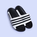 Stridez Classic Triple-Line Slides – Black & White Edition.