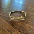 (C). Kate Spade Bow Bangle Bracelet. 