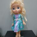 (B). Disney Frozen Snow Glow Elsa Doll Sings "Let it Go" Lights Up 13". 