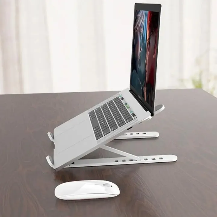 New%20High%20Quality%20Laptop%20Stand%20-%20Adjustable%20Portable%20Laptop%20Stand%20For%20Desk%20-%20Foldable%20Plastic%20Non-Slip%20Stand%20For%20Laptop%20And%20Tablet%20-%20Image%203