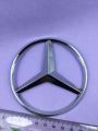 Mercedes monogram logo, emblem, trademark, sign, mark, symbol, stamp, monogram, motif, badge, design, shield or figure. 