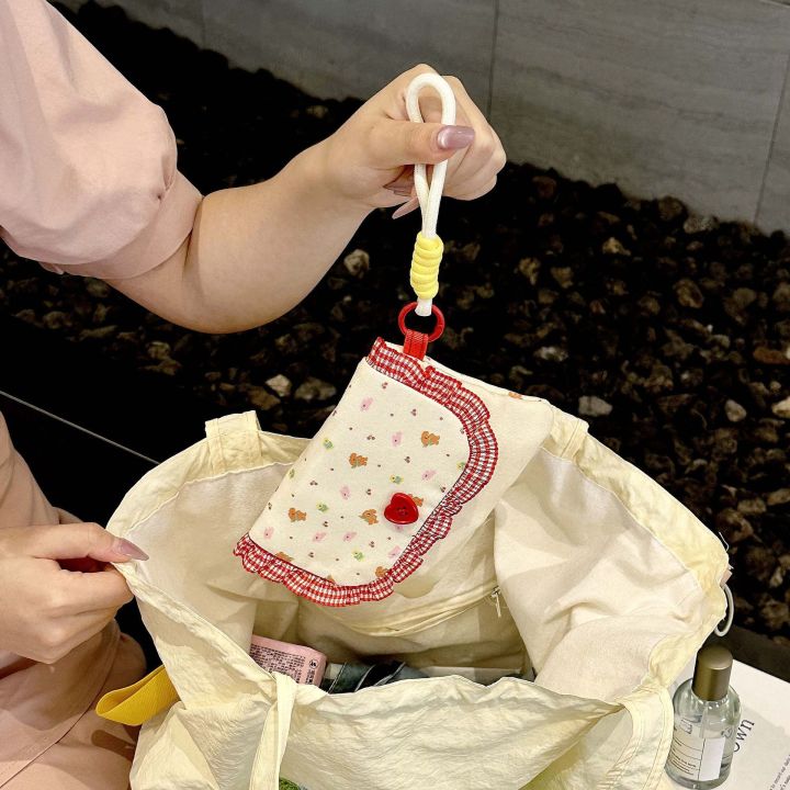 Cute%20floral%20sanitary%20napkin%20storage%20bag,%20female%20large%20capacity%20student%20portable%20handheld%20storage%20bag%20for%20going%20out%20-%20Image%202