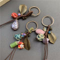 Handmade Bag Keychain Ceramic Pendant Pinecone Gourd Pendant for Handbag Car Phone Key Cute Bag Hanging Bell Accessories. 