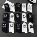 Random multiple pairs of men's crew socks graffiti ghost face unique street trend moisture wicking. 