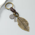 Fashion metal leaf pendant men keychains leather key ring. 