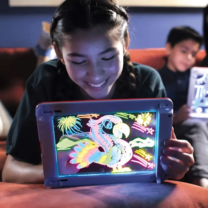 TAVORE%20Magic%20Pad%20Light-Up%20Drawing%20Board%20for%20Kids%20%E2%80%93%20Glowing%20Writing%20&%20Drawing%20Tablet%20with%20Neon%20Pens,%20Stencils%20&%20Fun%20Guide%20%7C%20Reusable%20&%20Educational%20Toy%20-%20Image%203