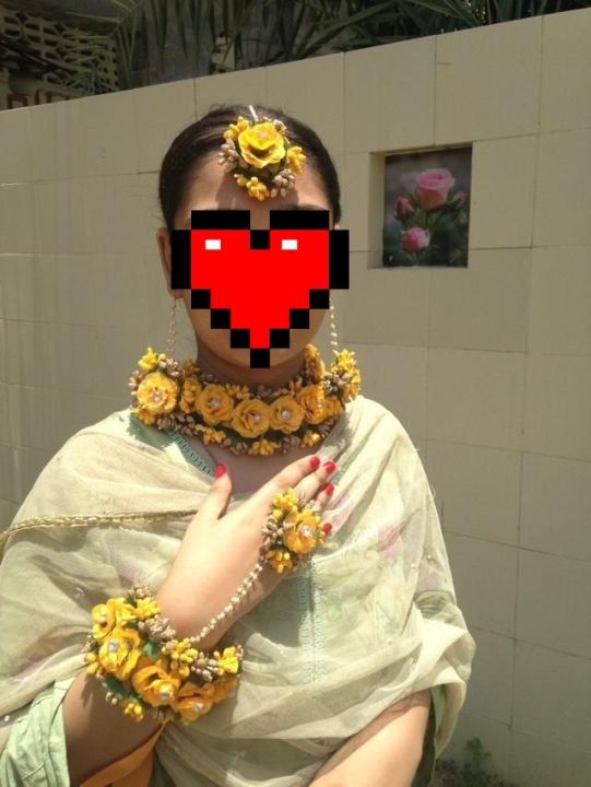 Artificial flower bridal jewellery set made with polyster fabric it includes (  earings,ring,tika,bracelet ,necklece)