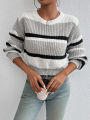 2024 autumn and winter hot sale new acrylic loose drop shoulder round neck color matching knitted long sleeve ladies sweater.