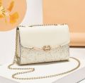 Women's Fashion Mini star glitter design hand purse bag.