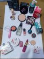 14 in 1 makeup deal. fixer, Pink magic, Cool Betty concealer stick, Romantic may lipstick, loose powder, primer, face powder, Beauty bank blush on, Cosmee highlighter, 4in1 glitter,base, Nail paint, 2in1 gel liner. 