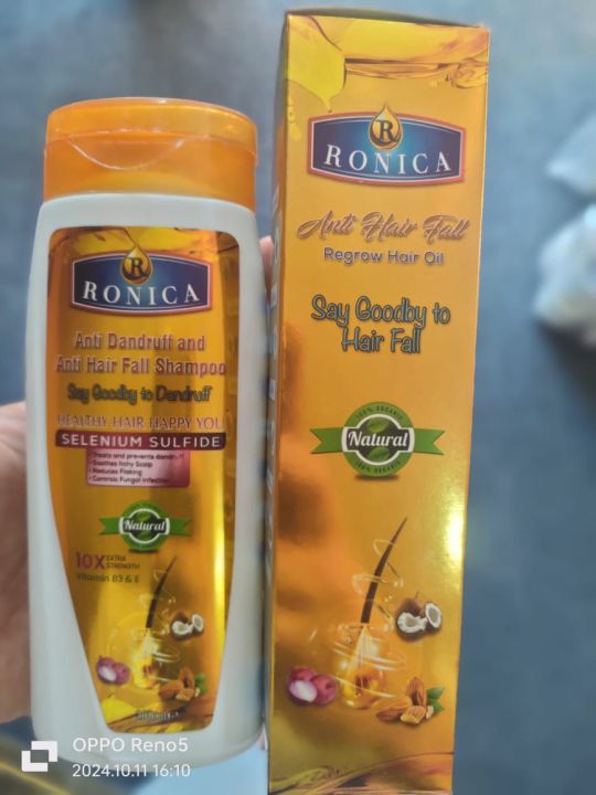Say goodbye to dandruff and hair fall with Ronica Shampoo and Hair Oil. This powerful anti-dandruff and anti-hair fall formula nourishes your scalp, strengthens roots, and helps regrow hair naturally. Experience healthier, stronger, and flake-free hair to